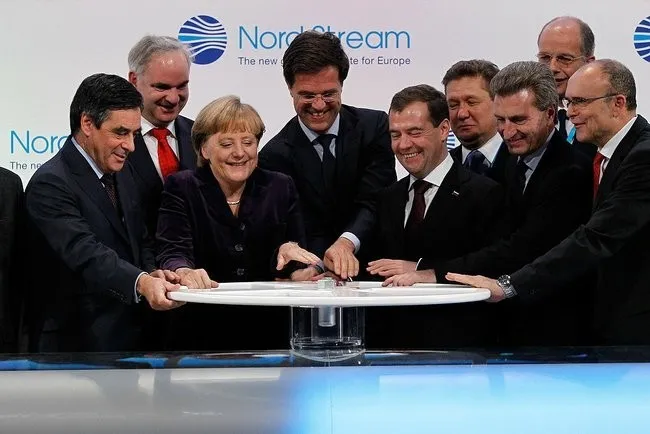The launch of the first Nord Stream line, 8 November 2011: A. Merkel, D. Medvedev, F. Fillon and M. Rutte at the symbolic valve. Photo: www.kremlin.ru. Licence: CC BY 4.0 (attribution to www.kremlin.ru required). Source: Wikimedia Commons https://commons.wikimedia.org/wiki/File:Nord_Stream_ceremony.jpeg